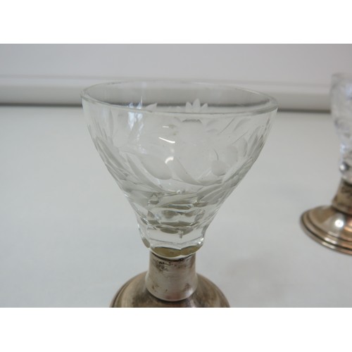 66 - Antique floral etched crystal decanter with stopper and a pair of etched crystal glass with silver s... 