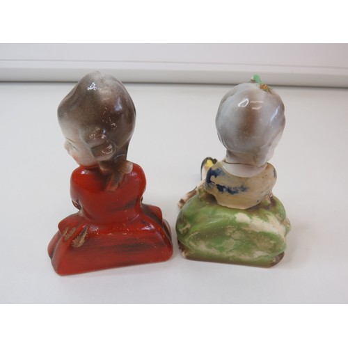 72 - A pair of early Antique Goebel Bookend figurines.