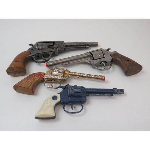 78 - Four vintage toy cap guns