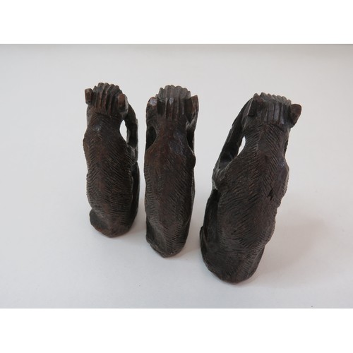 79 - Set of three carved wooden monkey figurines hear no, speak no, see no evil.