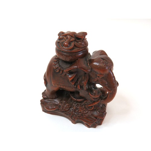 99 - Chinese carved Boxwood Lotus flower hand and Yuanbao coin Elephant statue.