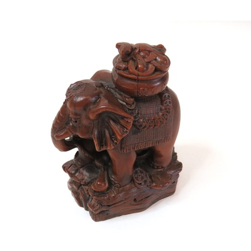 99 - Chinese carved Boxwood Lotus flower hand and Yuanbao coin Elephant statue.