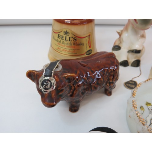 97 - Collectables to include, Bull whisky decanter (full), ceramic cow scissor holder/tape measure, Cherr... 