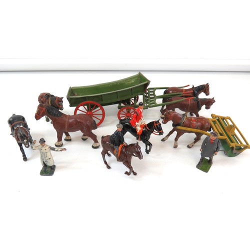 277 - Vintage Britains lead toys to include Huntsman on horse,  horses, cart etc.