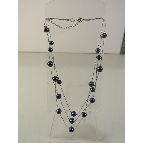 202 - Belgian design 'twice as nice' dark pearl three tier necklace