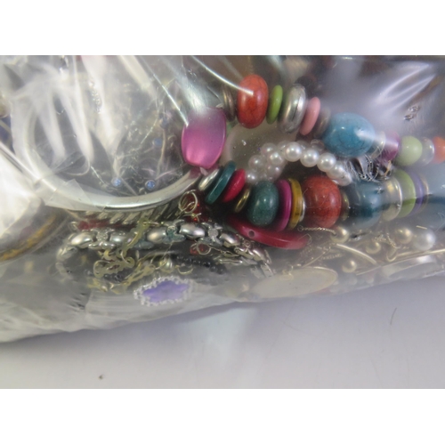 157 - 7kg Mixed unsorted jewellery