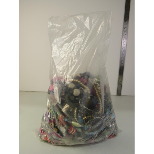 84 - 10kg bag of unsorted costume Jewellery.