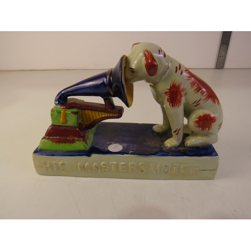 236 - His Masters Voice Staffordshire dog ornament.