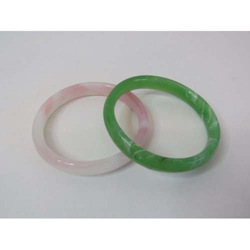 175 - Two jade bangles