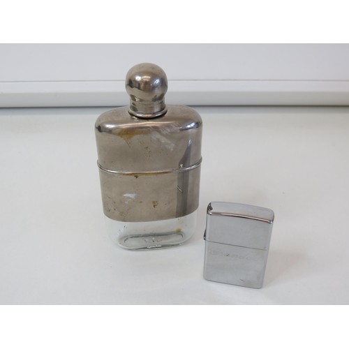 220 - Zippo lighter and a hipflask