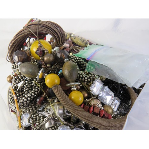 85 - 10kg bag of unsorted costume Jewellery.