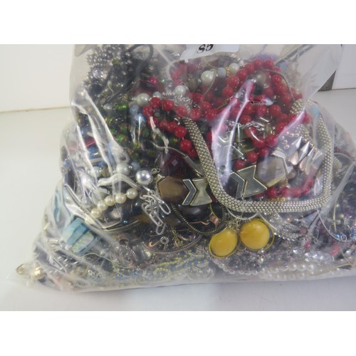 85 - 10kg bag of unsorted costume Jewellery.