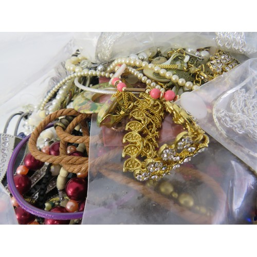 100 - 10kg bag of unsorted costume Jewellery.