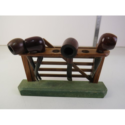 209 - Vintage pipe stand and four pipes