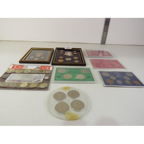 224 - Assortment of collectable coin sets and framed coins