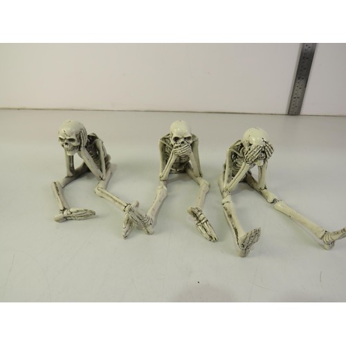 200 - Set of three speak, see and hear sitting skeleton's