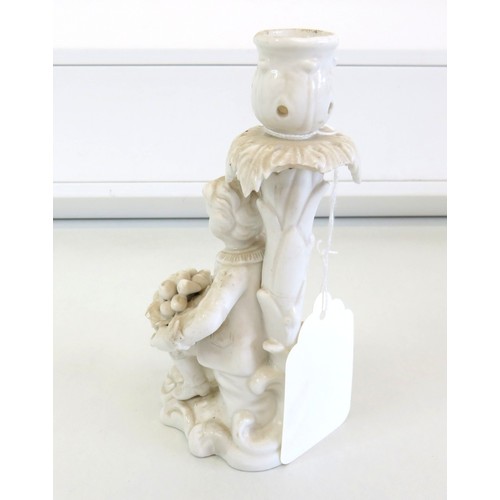 123 - Antique Derby Samson Hancock white porcelain boy with fruit candlestick, height 16cms. A/F