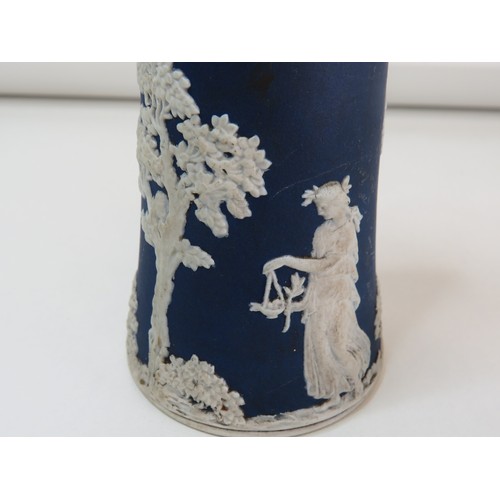 83 - Four Antique Wedgewood Jasperware items includes blue sugar shaker, two green lidded pots and Newcas... 