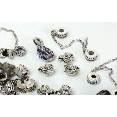 291 - Job lot of assorted 925 silver bracelet charms to include Pandora.