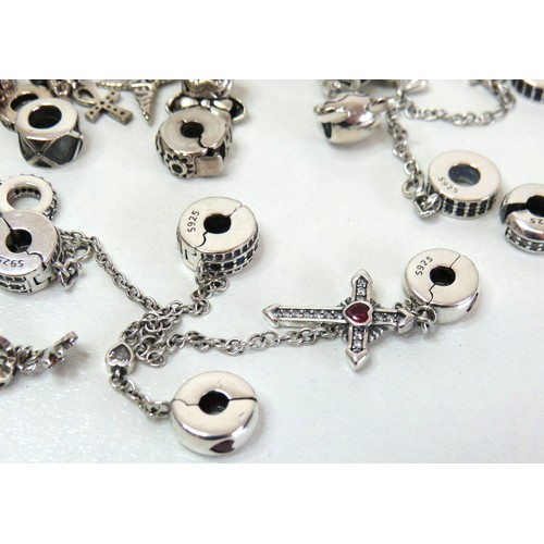 291 - Job lot of assorted 925 silver bracelet charms to include Pandora.