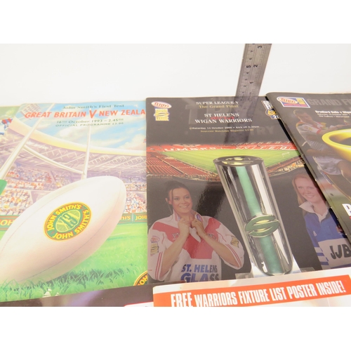 312 - Rugby league programmes and collectable simpsons books