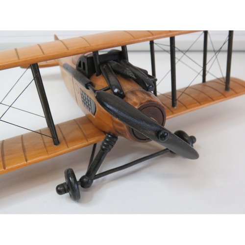 298 - Hand crafted wooden model Biplane, W36cm x L34cms.