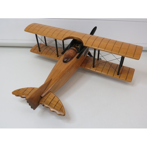 298 - Hand crafted wooden model Biplane, W36cm x L34cms.