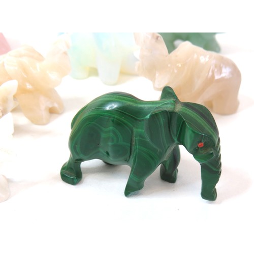 300 - Collection of gemstone elephant sculptures includes malachite, moonstone, Jade and reverse painted c... 