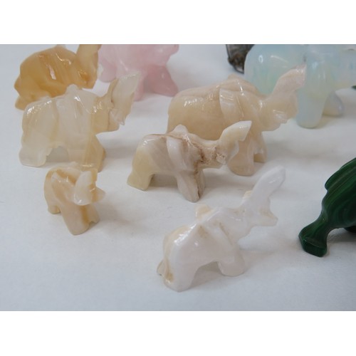 300 - Collection of gemstone elephant sculptures includes malachite, moonstone, Jade and reverse painted c... 