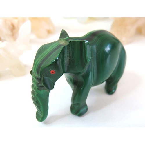 300 - Collection of gemstone elephant sculptures includes malachite, moonstone, Jade and reverse painted c... 