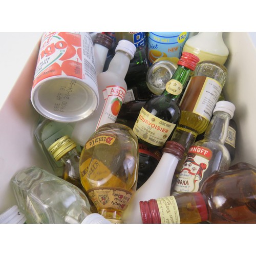 130 - A selection of miniature bottles of alcohol