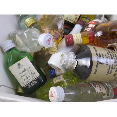 130 - A selection of miniature bottles of alcohol