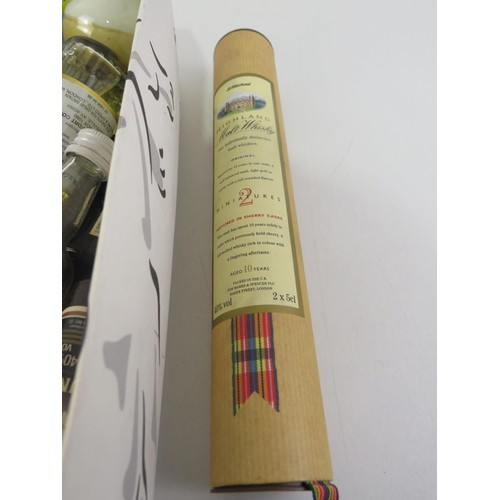 130 - A selection of miniature bottles of alcohol