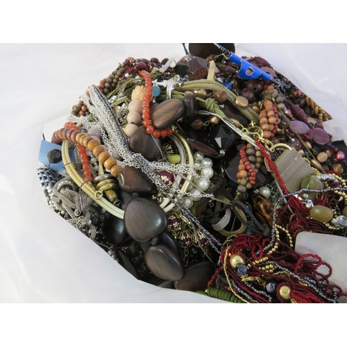 277 - 10kg bag of unsorted costume jewellery.