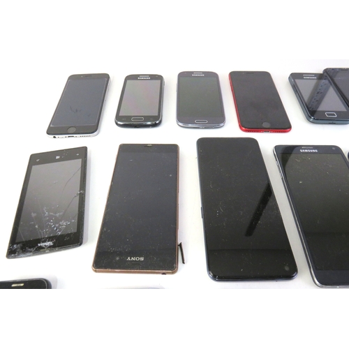 282 - A job lot of assorted mobile phones.