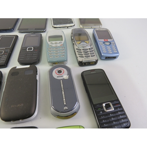 282 - A job lot of assorted mobile phones.