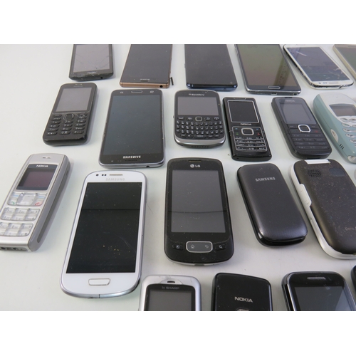 282 - A job lot of assorted mobile phones.