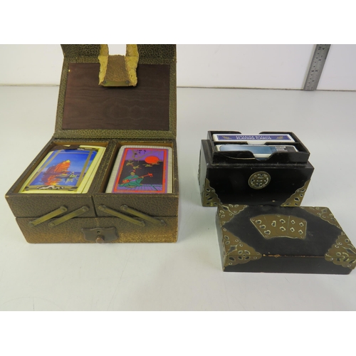 185 - Leather box of oriental playing cards, black lacquer box, brass detailing