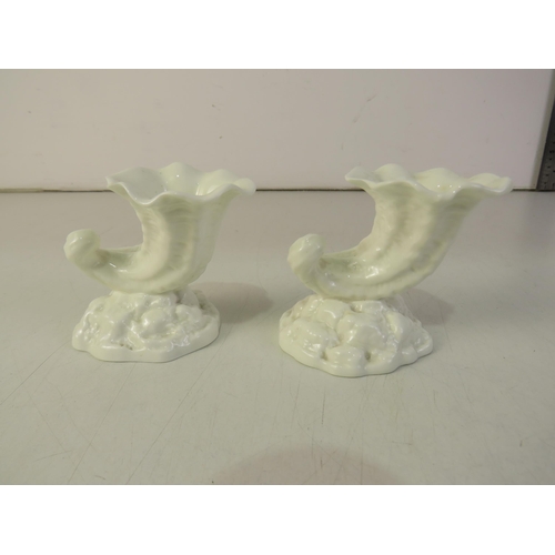 218 - A pair of Royal Worcester cornucopia vases