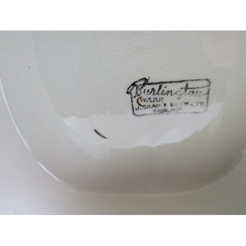 385 - Four toby jugs including two Burlington ware and Royal Doulton Beefeaters and Falstaff