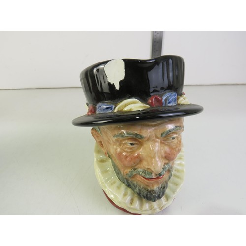 385 - Four toby jugs including two Burlington ware and Royal Doulton Beefeaters and Falstaff