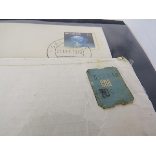 7 - Two albums full of assorted stamps and first day covers