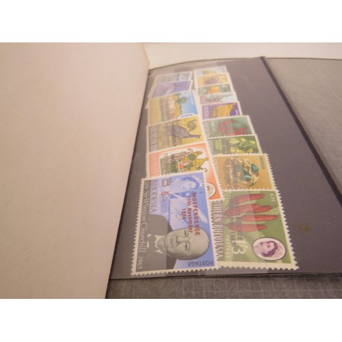 8 - Four albums of assorted stamps, 2004 +2005 Korean stamp pack and American commemorative Harry S. Tru... 