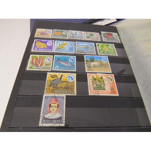 8 - Four albums of assorted stamps, 2004 +2005 Korean stamp pack and American commemorative Harry S. Tru... 