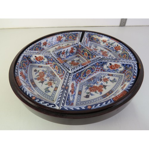 13 - Chinese lazy susan turntable with dragon design lid and blue and white dishes
