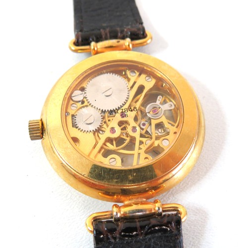 51 - Ladies Zeon Skeleton gold plated hand wind watch, working.