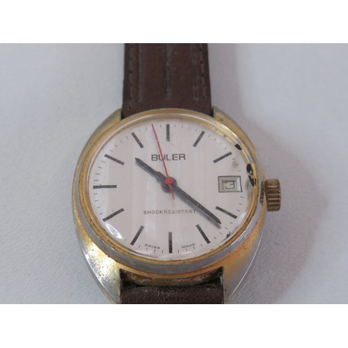 53 - 1970's Buler hand wind date watch, working.