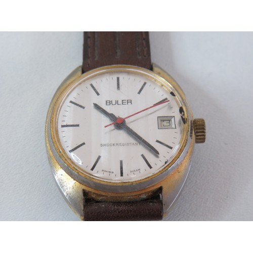 53 - 1970's Buler hand wind date watch, working.