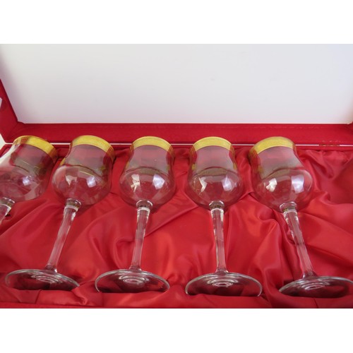 41 - Four boxed sets of crystal including Rockingham Crystal red glass wine glasses