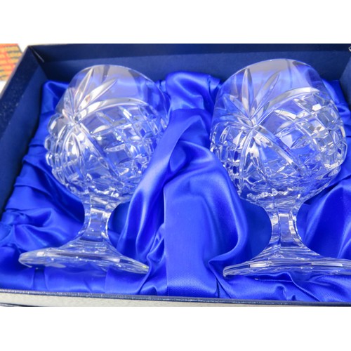 41 - Four boxed sets of crystal including Rockingham Crystal red glass wine glasses